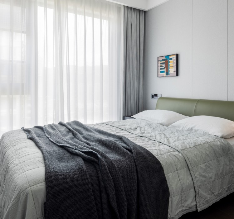 現(xiàn)代簡約三居室裝修臥室效果圖